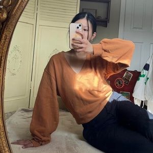 Agolde burnt orange V-neck sweatshirt with balloon sleeves